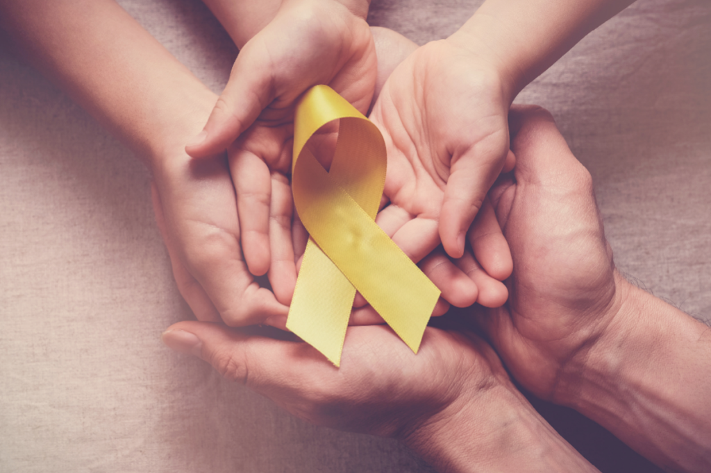 Yellow Ribbon on Hands