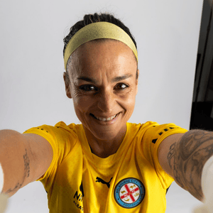 Melissa Barbieri, former Matildas goalkeeper and Endometriosis Australia ambassador, wearing a yellow Melbourne City FC jersey